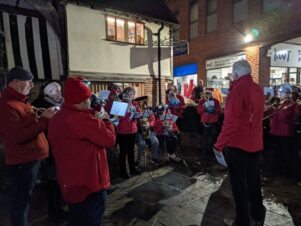 Carolling for Late Night Shopping outside Bridge Cottage, Uckfield, 3 December 2021.