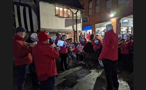 Carolling for Late Night Shopping outside Bridge Cottage, Uckfield, 3 December 2021.